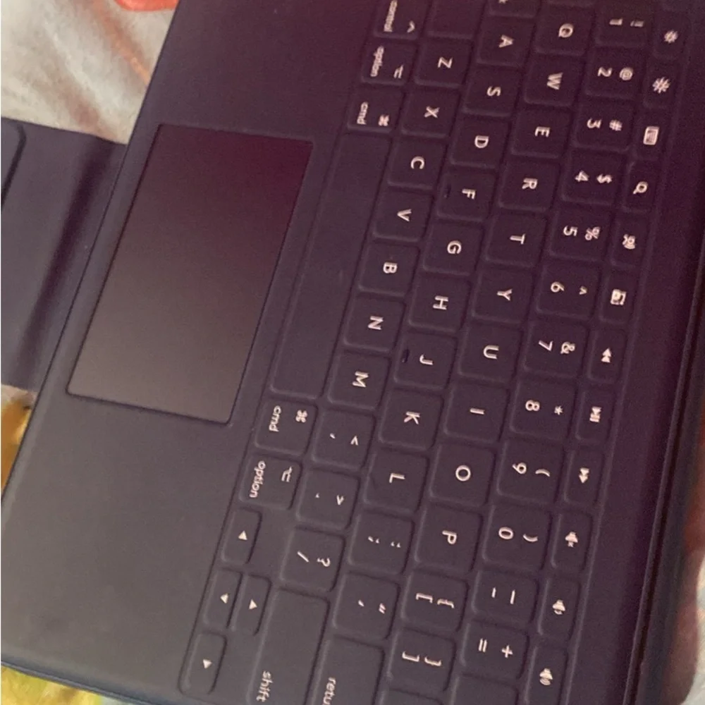 Apple Tablet with Gray and Red Accents